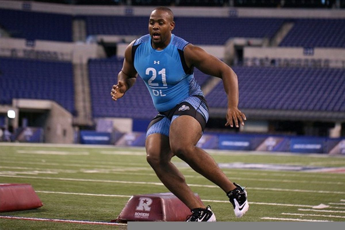 Feb 27, 2012; Indianapolis, IN, USA; Regina defensive lineman Akiem Hicks does a footwork drill during the NFL Combine at Lucas Oil Stadium. Mandatory Credit: Brian Spurlock-US PRESSWIRE