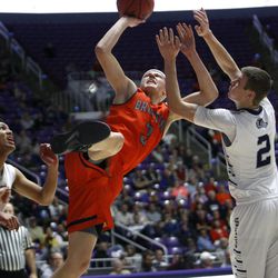 Brighton's Brock Miller (3) goes up for a shot in the 5A boys state basketball quarterfinals at the Dee Events Center in Ogden Wednesday, Feb. 25, 2015. Brighton held on for the 65-56 victory.