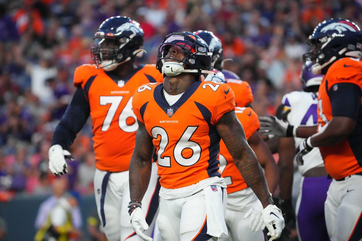 Denver Broncos running back Mike Boone (26) reacts following a turnover in the first quarter against the Minnesota Vikings at Empower Field at Mile High.