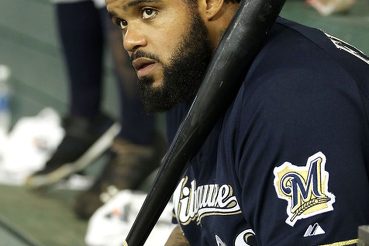 Prince Fielder watches from the dugout as Josh Collmenter dismantles his team.