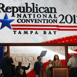 Mia Love, 4th District congressional candidate, who will be speaking at the Republican National Convention practices at the podium in the Tampa Bay Times Forum Monday night. Monday, Aug. 27, 2012 
