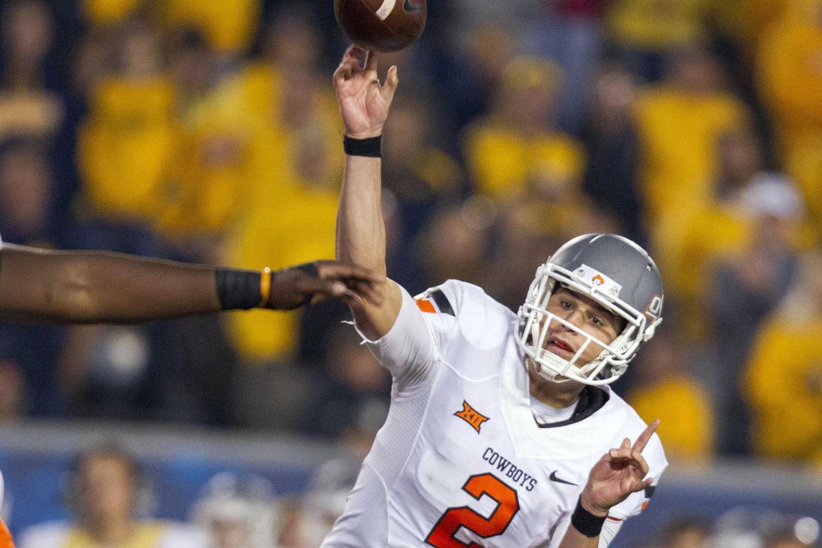 Husky fans will always have Halloween nightmares about this Oklahoma State QB.