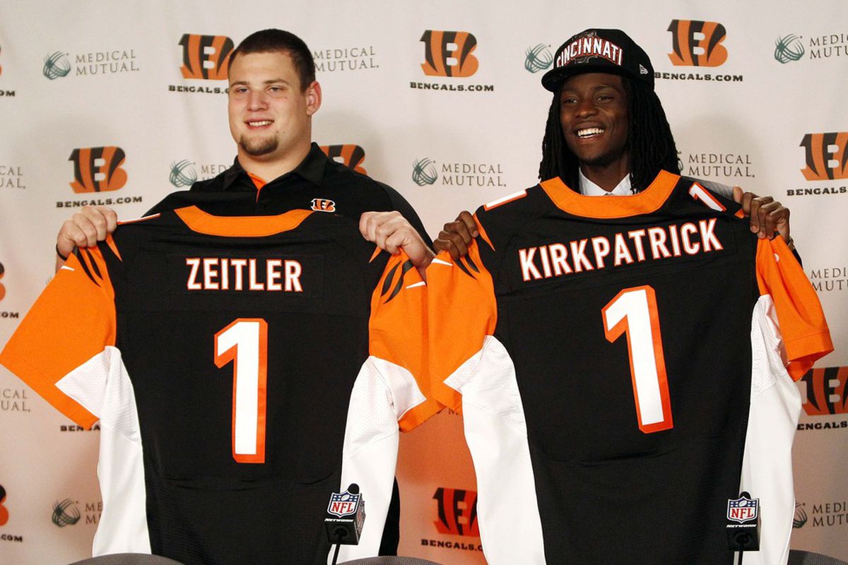 Apr 27, 2012; Cincinnati, OH, USA; Cincinnati Bengals first round draft picks Dre Kirkpatrick and Kevin Zeitler hold up their jerseys during the press conference at Paul Brown Stadium. Mandatory Credit: Frank Victores-US PRESSWIRE