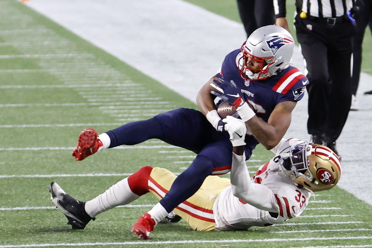 San Francisco 49ers safety Tarvarius Moore (33) tackles New England Patriots wide receiver Jakobi Meyers (16) during a game between the New England Patriots and the San Francisco 49ers on October 25, 2020, at Gillette Stadium in Foxborough, Massachusetts.