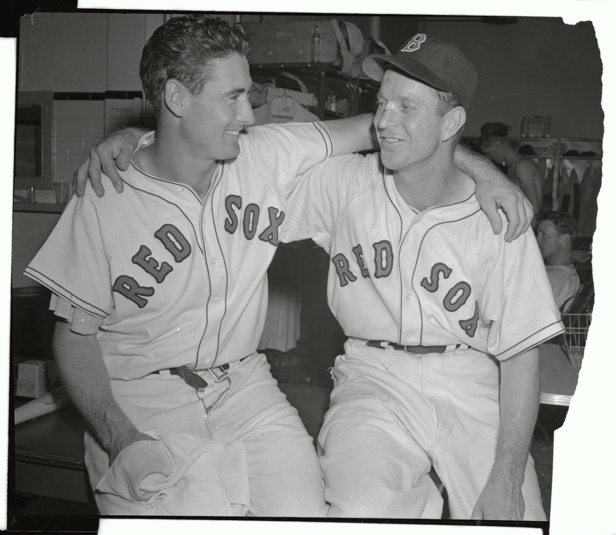 Ted Williams and Ellis Kinder Embracing Due to Victory