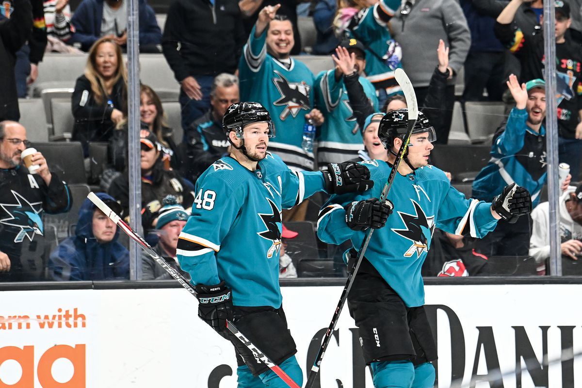 Timo Meier #28 and Tomas Hertl #48 of the San Jose Sharks celebrate scoring a goal against the Anaheim Ducks at SAP Center on March 26, 2022 in San Jose, California.