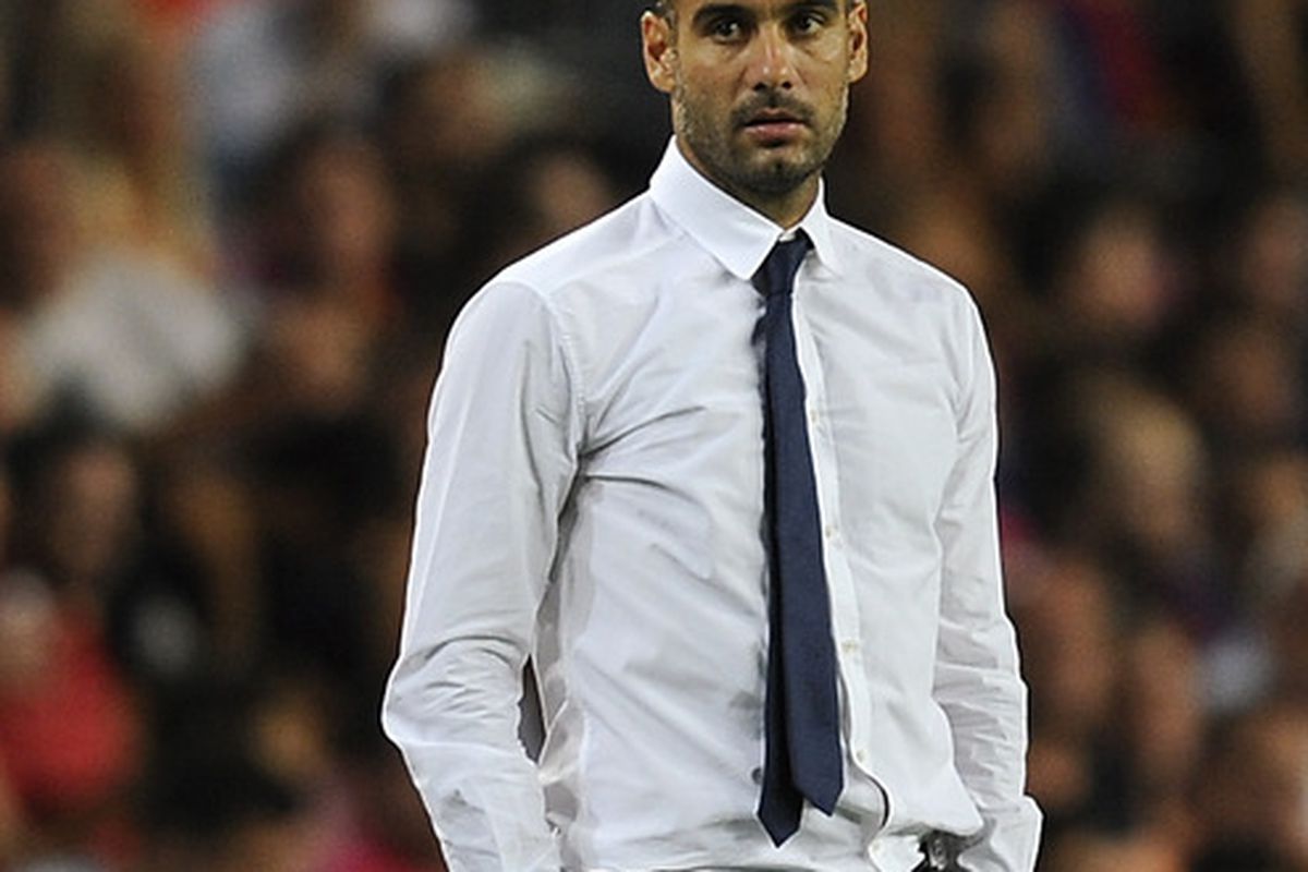 Josep Guardiola of FC Barcelona looks on as his squad demolishes Villareal at the Camp Nou.  His use of an unusual 3-4-3 formation proved deadly.