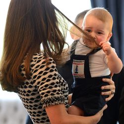 2. Taking snot to the hair with ease at Prince George's first public engagement/playdate. In this particular way, she shares superhuman qualities with most, if not all moms. 
