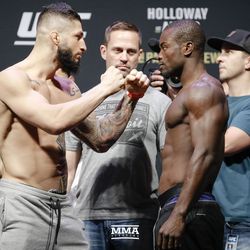 Sabah Homasi and Alhassan square off at UFC 218 weigh-ins.