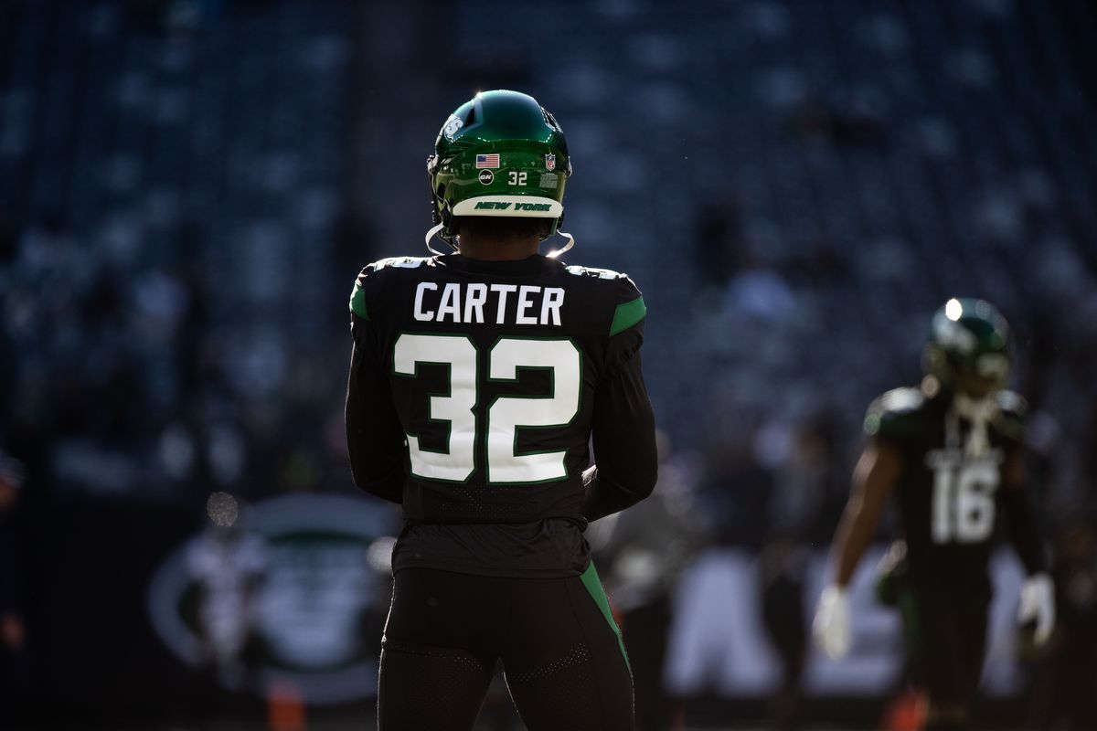 Michael Carter #32 of the New York Jets warms up before the start of a game against the Jacksonville Jaguars at MetLife Stadium on December 26, 2021 in East Rutherford, New Jersey.