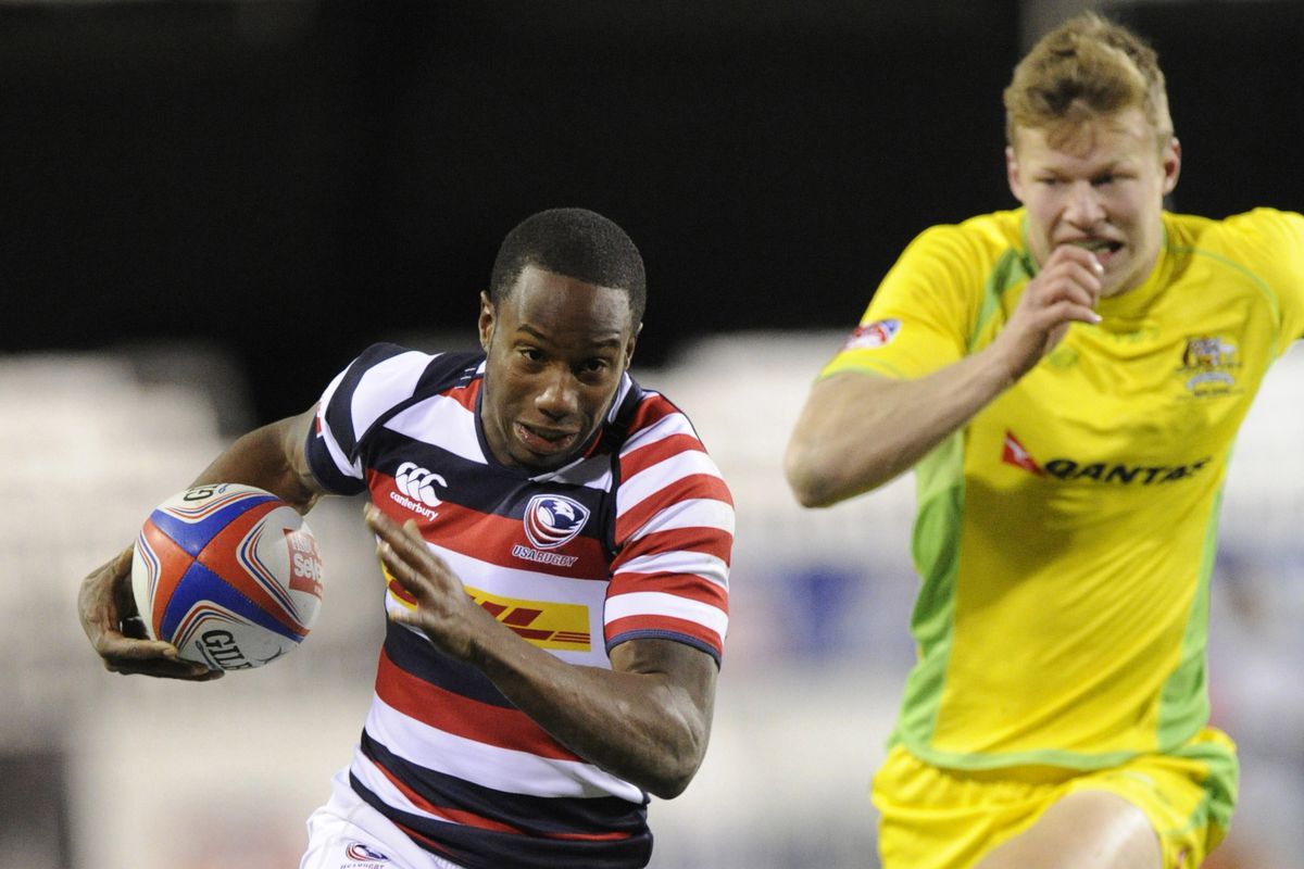 United States player Carlin Isles scores a try against Australia in the second half of a sevens rugby match during the 2013 HSBC Sevens World Series at Sam Boyd Stadium.