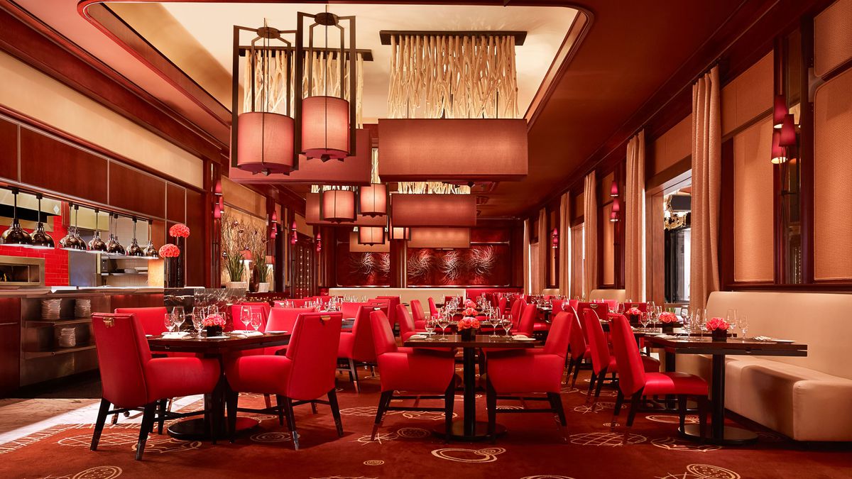 A restaurant with a very red interior