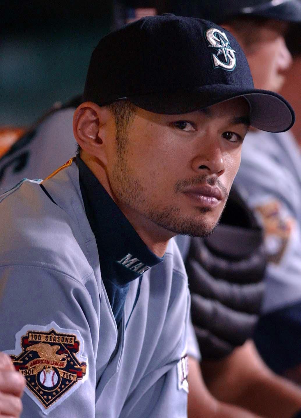 Seattle Mariners’ Ichiro Suzuki sits in the dugout