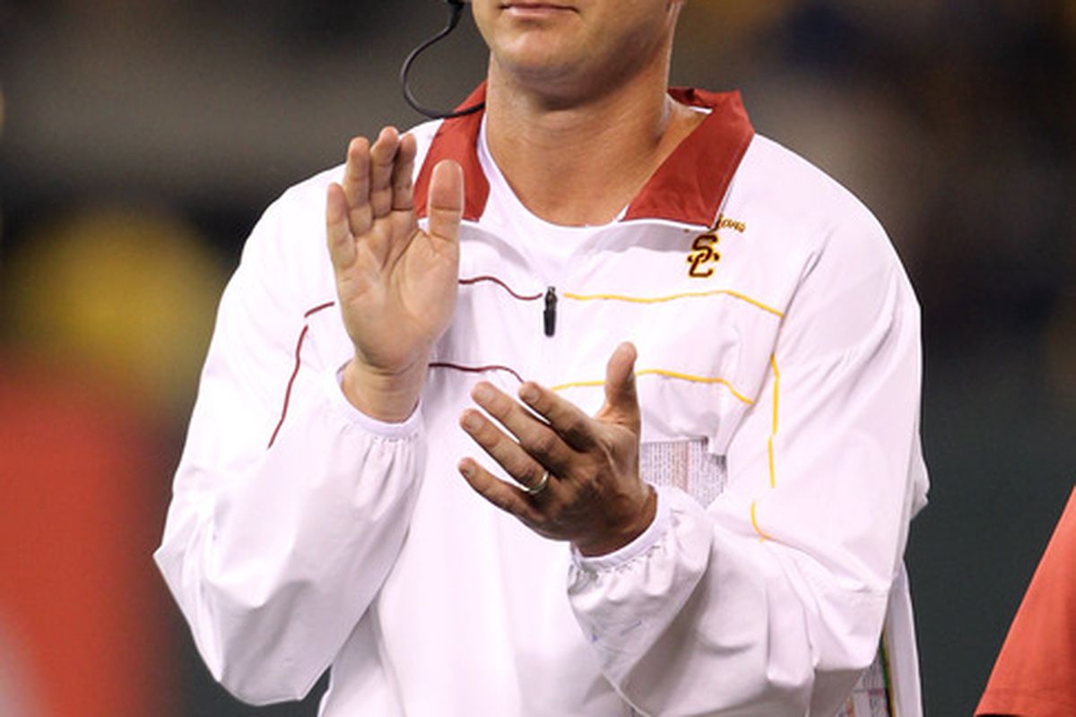 SAN FRANCISCO, CA - OCTOBER 13:  USC Trojans head coach Lane Kiffin cheers on his team during their game against the California Golden Bears at AT&T Park on October 13, 2011 in San Francisco, California.  (Photo by Ezra Shaw/Getty Images)