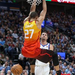 Utah Jazz center Rudy Gobert (27) dunks during the game against the Golden State Warriors at Vivint Arena in Salt Lake City on Tuesday, Jan. 30, 2018.