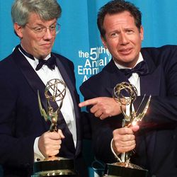 CORRECTS SPELLING OF GARRY - FILE - In this Sept. 13, 1998 file photo, Peter Tolan, left, and Garry Shandling pose with their Emmy awards for outstanding writing for a comedy series award for "The Larry Sanders Show,"  at the 50th Annual Primetime Emmy Awards in Los Angeles. Shandling, who as an actor and comedian pioneered a pretend brand of self-focused docudrama with "The Larry Sanders Show," died, Thursday, March 24, 2016 of an undisclosed cause in Los Angeles. He was 66. 