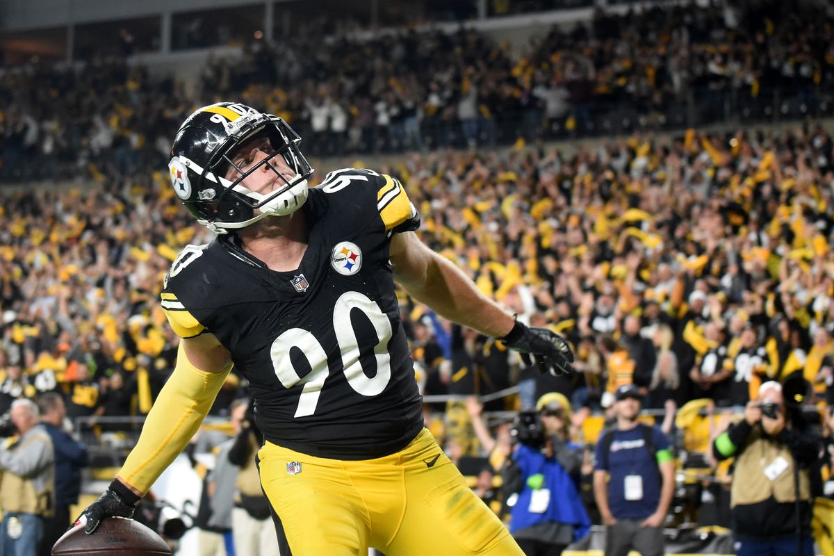 Pittsburgh, Pennsylvania, USA; Pittsburgh Steelers linebacker T.J. Watt (90) celebrates after scoring a touchdown in the fourth quarter against the Cleveland Browns at Acrisure Stadium. The score put the Steelers ahead as they won 26-22.