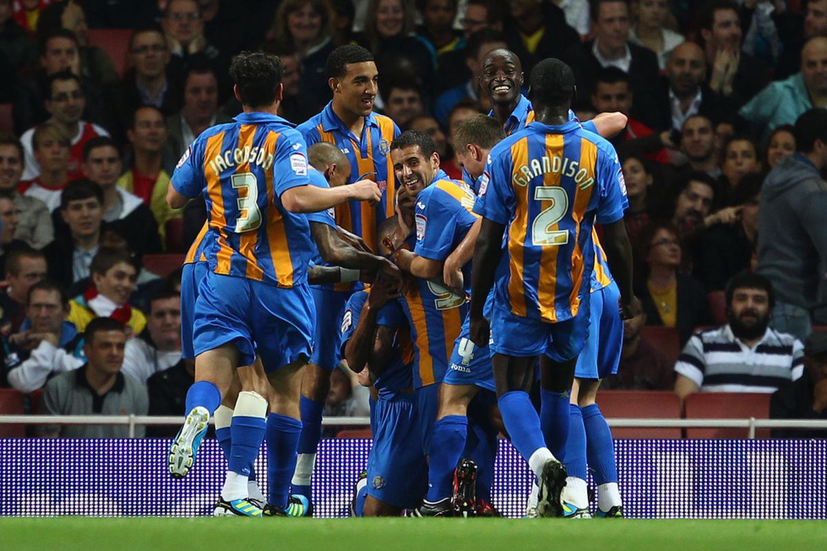 Shrewsbury celebrate their goal at the Emirates during last season's competition. (Photo by Julian Finney/Getty Images)