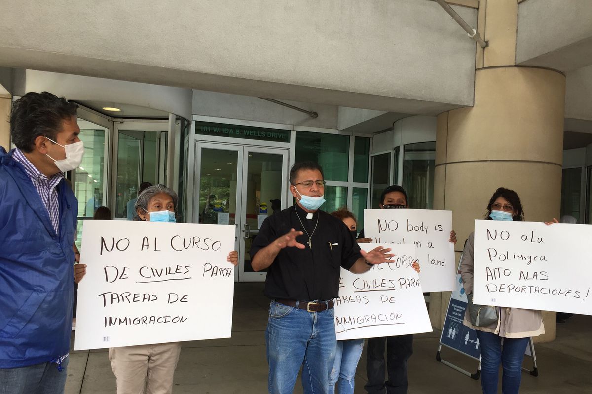 Immigration activists gathered Monday, Aug. 3, 2020, outside the U.S. Immigration and Customs Enforcement Chicago field office to announce a protest Sept. 15 of ICE’s “Citizens Academy.”