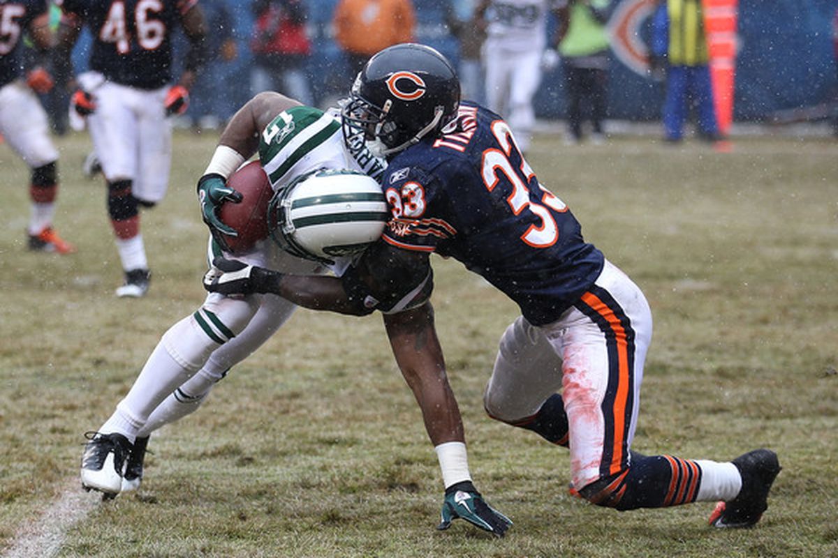 Charles Tillman: forcing others to drop the ball on the field, and carrying the ball for children off of it.