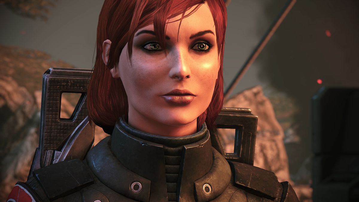 Mass Effect - Commander Shepard, a young woman with red hair and freckles, stands on Eden Prime.