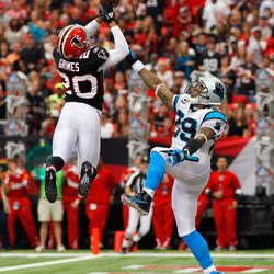 ATLANTA, GA - OCTOBER 16: Brent Grimes #20 of the Atlanta Falcons intercepts this touchdown reception that was tipped but intended for Steve Smith #89 of the Carolina Panthers at Georgia Dome on October 16, 2011 in Atlanta, Georgia