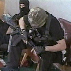 Hostages sit with their weapons in the school in Beslan, Russia taken  in this undated image from television during the early part of the siege which began on  Sept. 1, 2004 and ended with over 300 people dead. Two suspects in the Boston Marathon bombing have been identified to The Associated Press as coming from a Russian region near Chechnya  In the past, insurgents from Chechnya and neighboring restive provinces in the Caucasus have been involved in terror attacks in Moscow and other places in Russia.