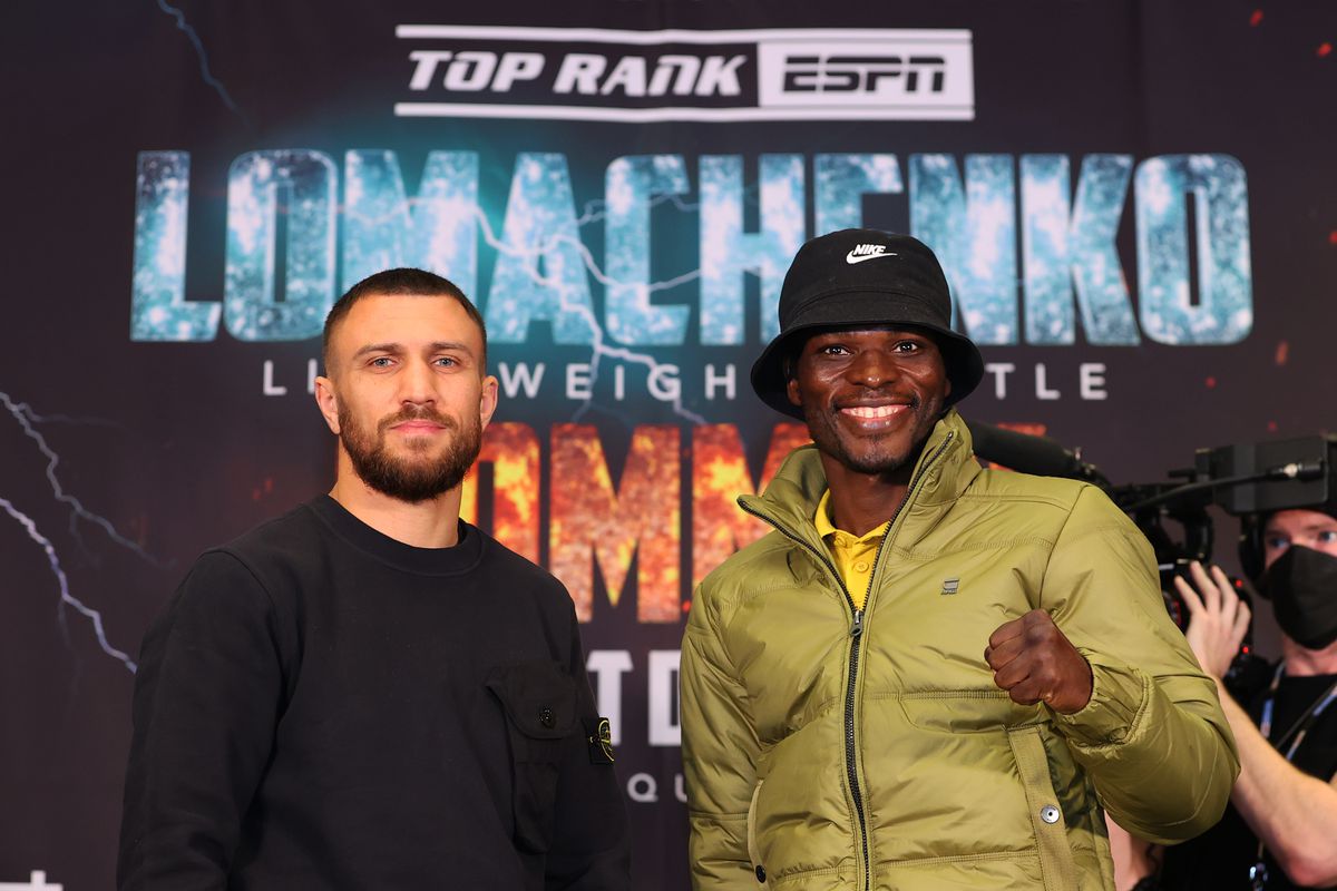 Vasiliy Lomachenko (L) and Richard Commey (R) pose during the press conference at Chase Square at Madison Square Garden on December 09, 2021 in New York, New York.