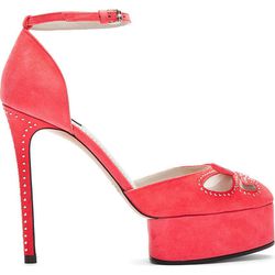 <b>Marc Jacobs</b>, <a href="https://www.ssense.com/women/product/marc_jacobs/bright-pink-suede-studded-ankle-strap-pumps/65296">$238</a> (from $795)

