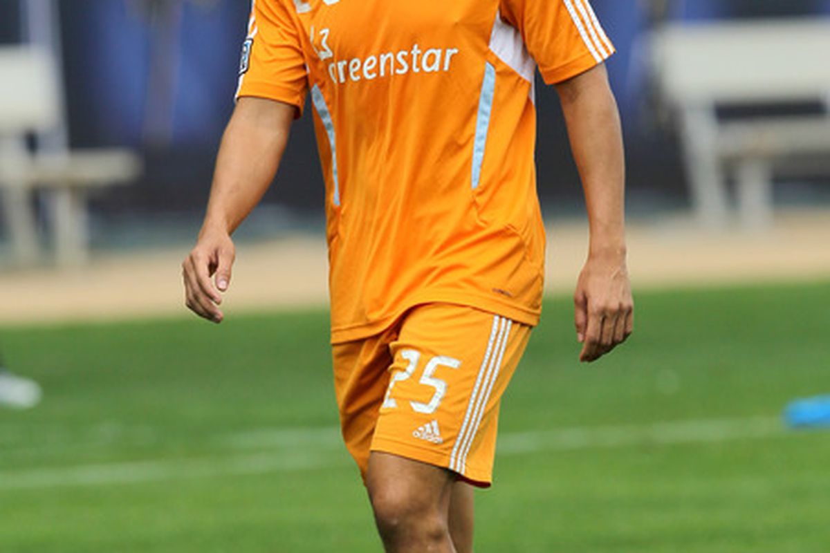 CARSON, CA - NOVEMBER 19:  Brian Ching #25 of the Houston Dynamo smiles during a training session ahead of the MLS Cup at The Home Depot Center on November 19, 2011 in Carson, California.  (Photo by Stephen Dunn/Getty Images)