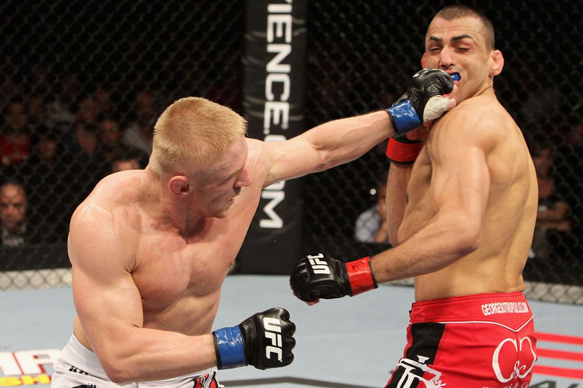 Dennis Siver lands on George Sotiropoulos - Photo by Josh Hedges/Zuffa LLC via Getty Images