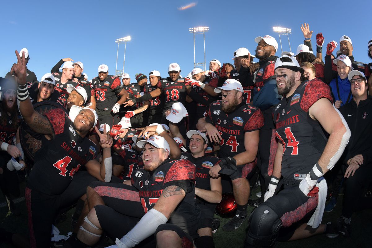 San Diego State players celebrate after the New Mexico Bowl against Central Michigan at Dreamstyle Stadium. San Diego State defeated Central Michigan 48-11. 