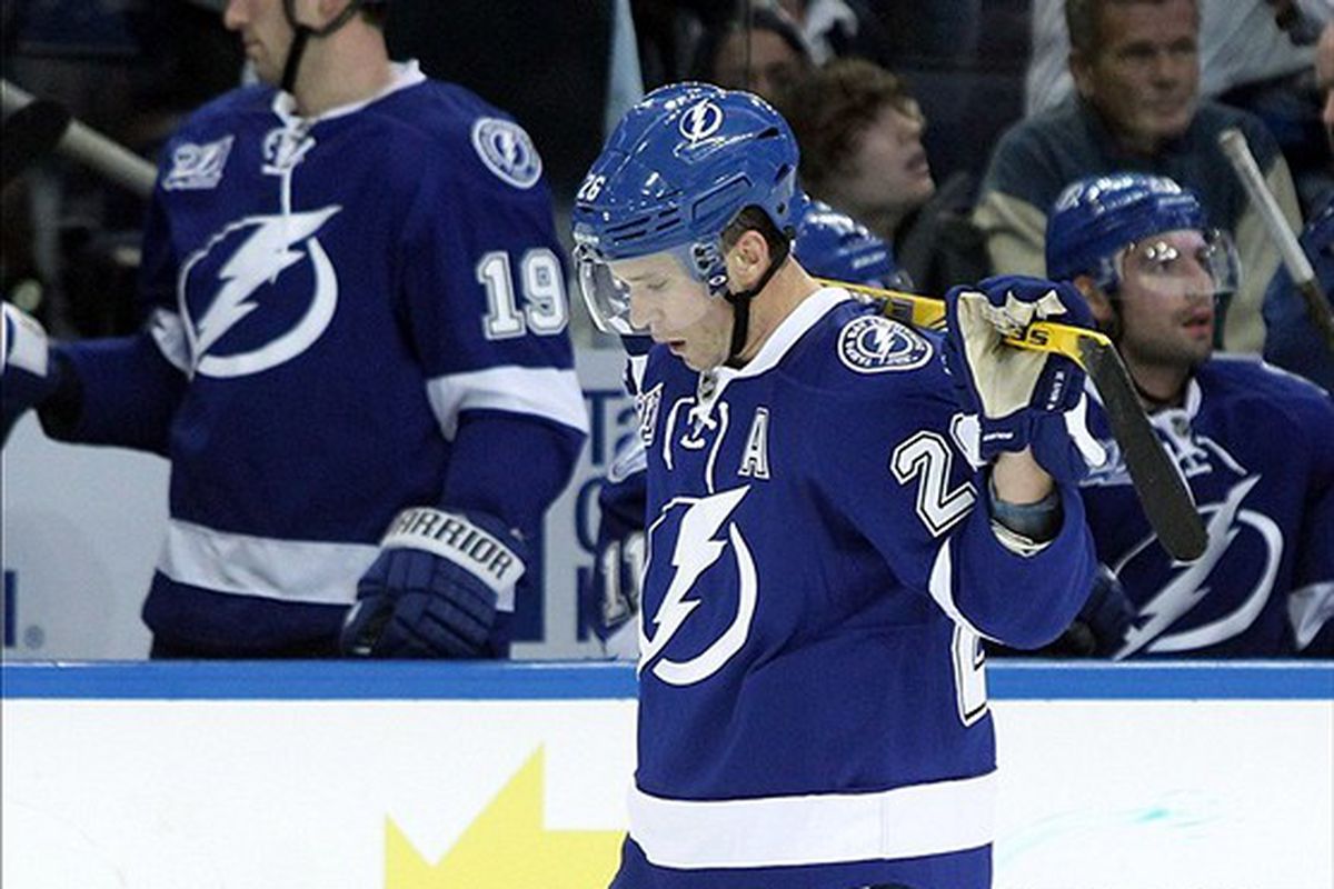 Yep, this one hurts. Marty St. Louis is dejected after a 2-1 home loss to the Winnipeg Jets