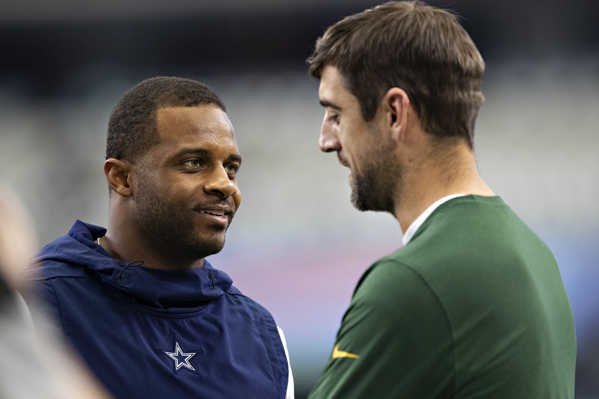 Randall Cobb #18 of the Dallas Cowboys talks before the game with Aaron Rodgers #12 of the Green Bay Packers at AT&amp;T Stadium on October 6, 2019 in Arlington, Texas. The Packers defeated the Cowboys 34-24.