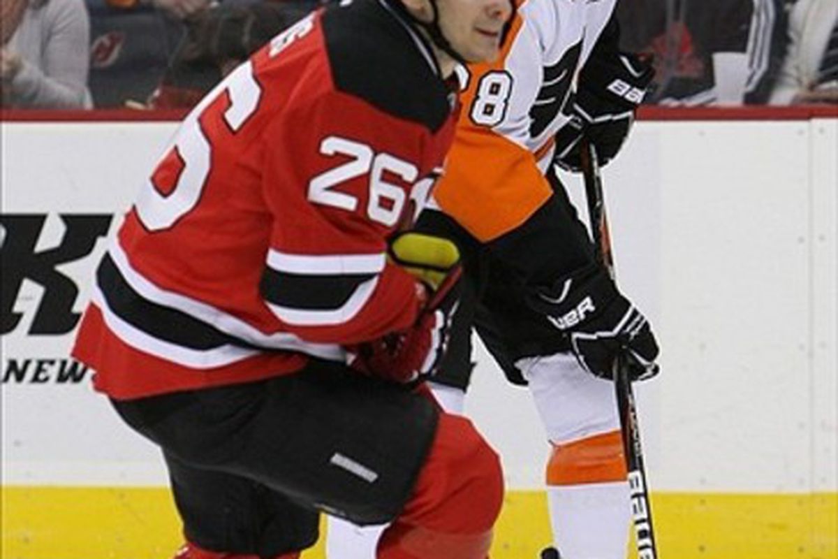No guys, Patrik Elias is not on the ice to talk to Claude Giroux about life as a ginger.