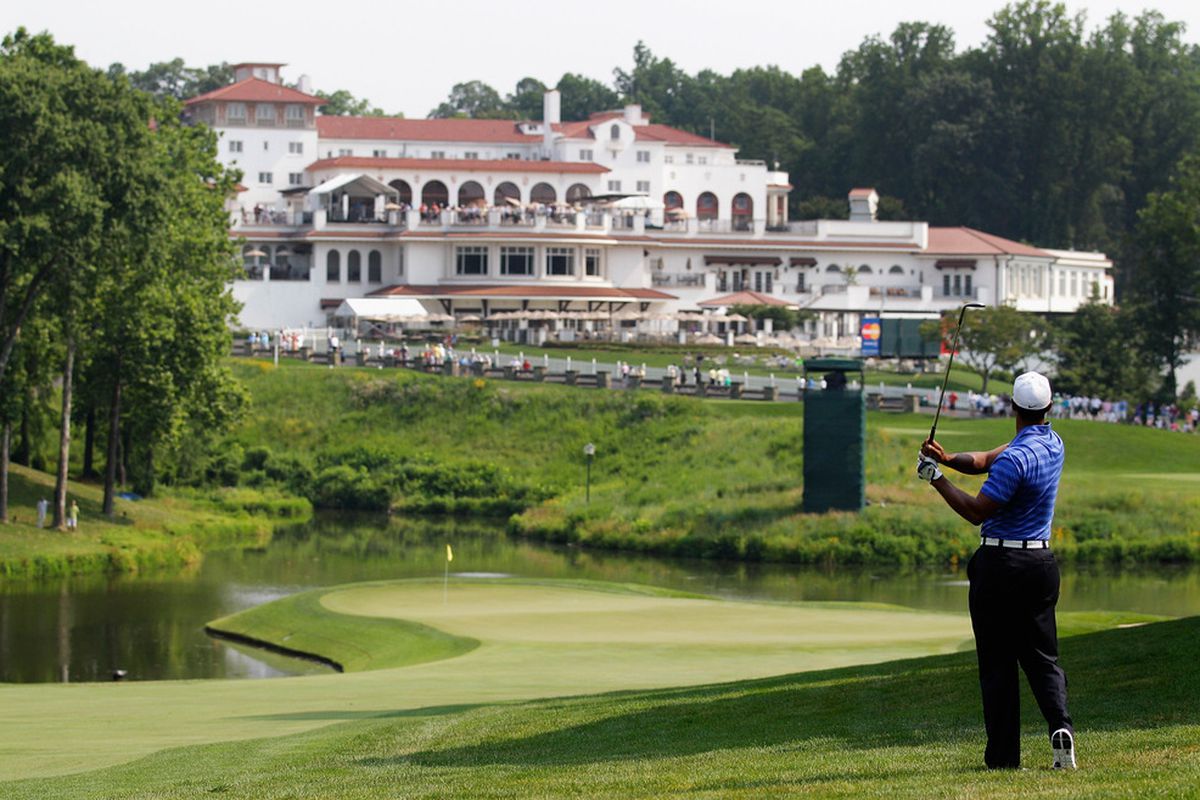 BETHESDA, MD - JUNE 29: Tiger Woods follows his second shot to the 18th green during Round Two of the AT&T National at Congressional Country Club on June 29, 2012 in Bethesda, Maryland.  (Photo by Rob Carr/Getty Images)
