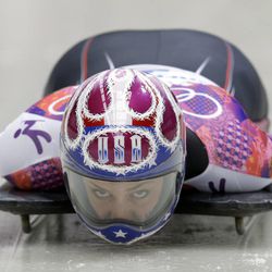 Noelle Pikus-Pace of the United States starts her third run during the women's skeleton competition at the 2014 Winter Olympics, Friday, Feb. 14, 2014, in Krasnaya Polyana, Russia.