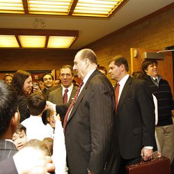 President Thomas S. Monson visits with members after speaking at a sacrament meeting for the Etobicoke and Churchville YSA wards, Mississaugua Ontario Stake, on Sunday, June 26.  Sunday, June, 26, 2011.