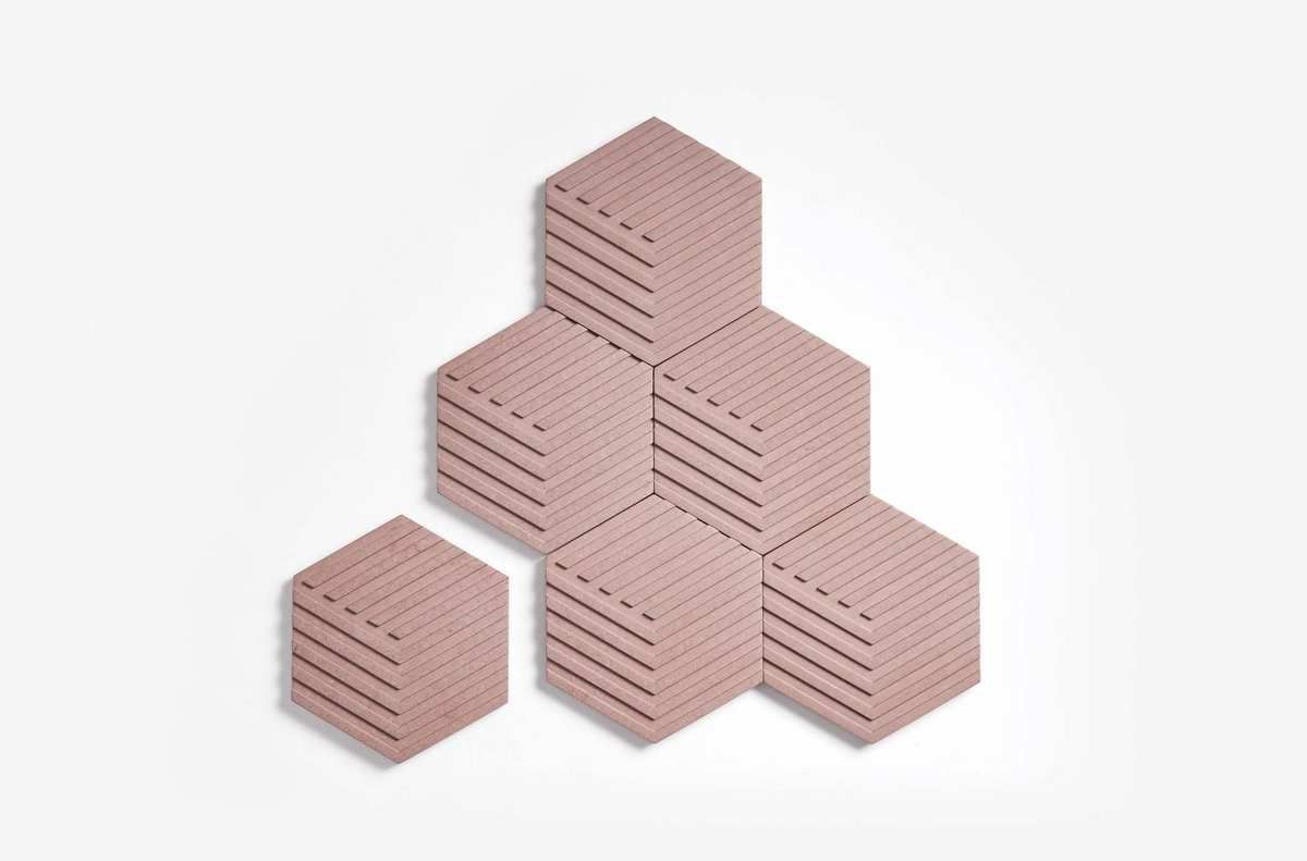 Hexagonal tiles in a blush color.