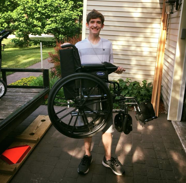 Coltyn Turner unloads the wheelchair he used to be reliant on during his recent move back to downstate Illinois. | Facebook