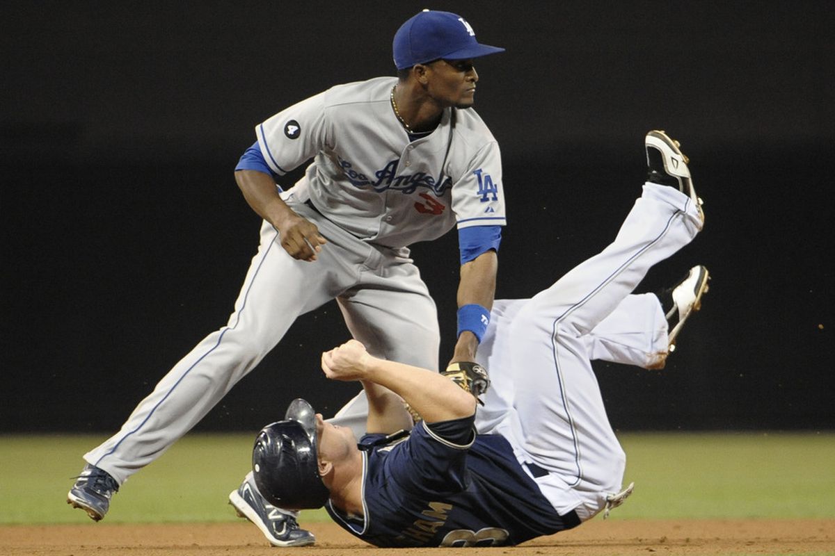 Aaron Cunningham demonstrates his ability to fight from the ground effectively against the Dodger's Eugenio Velez. (Photo by Denis Poroy/Getty Images)