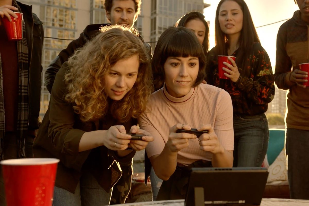 Nintendo Switch - ‘Karen’ playing switch on rooftop