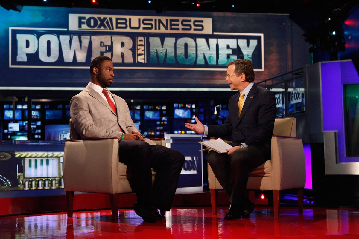 NEW YORK, NY - FEBRUARY 08:  New York Giants Defensive End Justin Tuck (L) visits FOX's "Power and Money" at FOX Studios on February 8, 2012 in New York City.  (Photo by Cindy Ord/Getty Images)