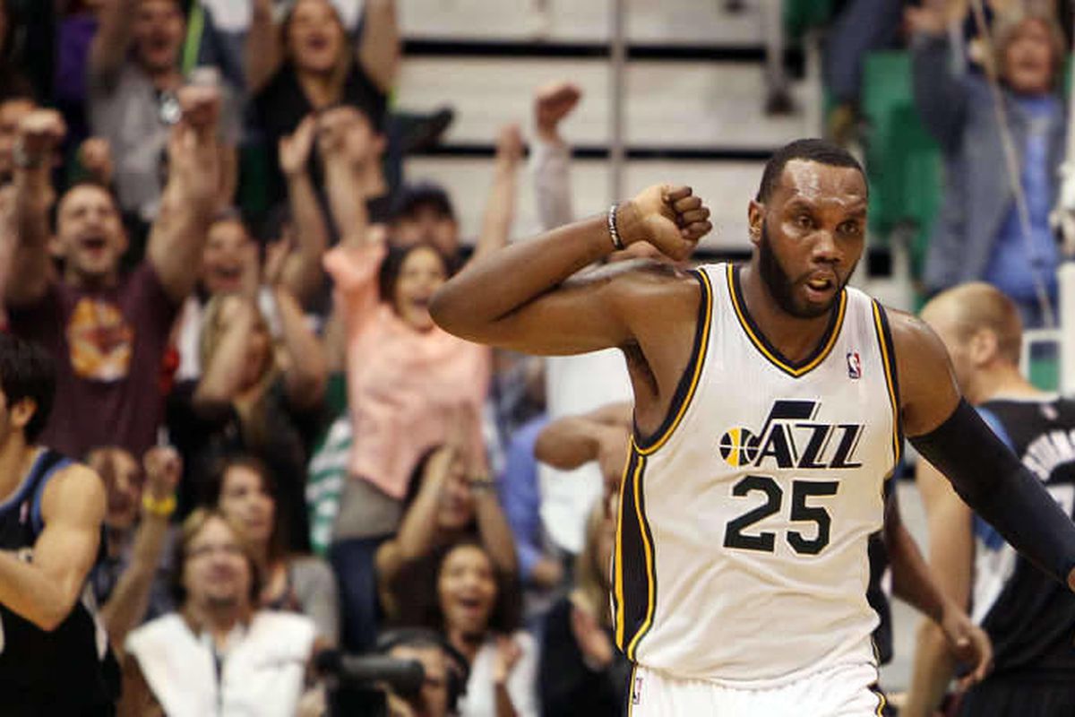 Al Jefferson of the Utah Jazz celebrates hitting a shot in the last minute of the game against Minnesota during NBA basketball in Salt Lake City, Friday, April 12, 2013.