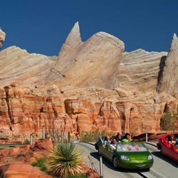 Visitors to California Adventure's new Cars Land can race through Ornament Valley in high-speed slot cars designed to look like the cars in "Cars" and "Cars 2."