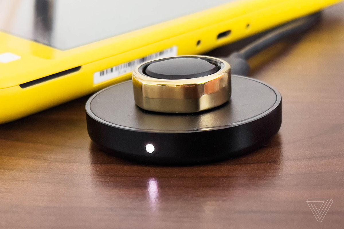 The Oura Ring Gen 3 on its charging stand.