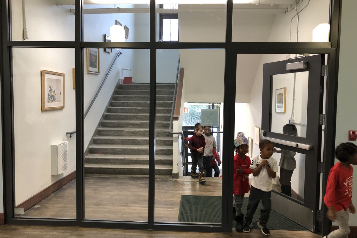 Students walk through the hallways at the newly renovated Detroit Prep, a charter school in the Pingree Park neighborhood.
