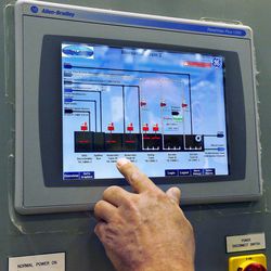 Treatment manager Shane Paddock works at the process control panel at the Jordanelle Special Service District treatment plant, Monday, Feb. 23, 2015.

