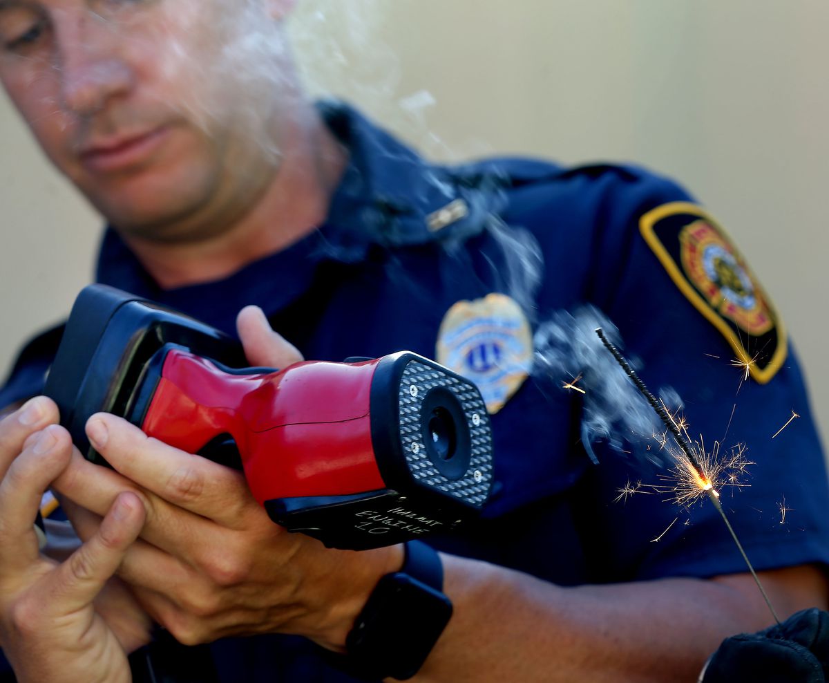 Salt Lake City Fire Capt. Adam Archuleta uses a thermal imaging camera to measure the heat from a sparkler during a Fourth of July fireworks demonstration at Fire Station No. 10 in Salt Lake City on Wednesday, July 3, 2019. According to National Fire Prot