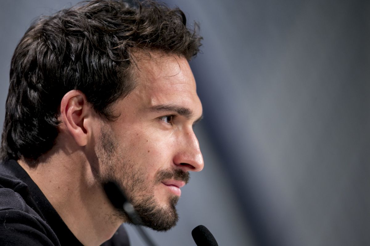 Mats Hummels of FC Bayern Muenchen talks to the media during a press conference ahead the Campions League match between FC Bayern Muenchen and Besiktas Istanbul at Allianz Arena on February 19, 2018 in Munich, Germany.